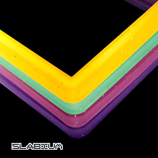 Slabium Guard Bumper PSA slab protectors stacked on black
